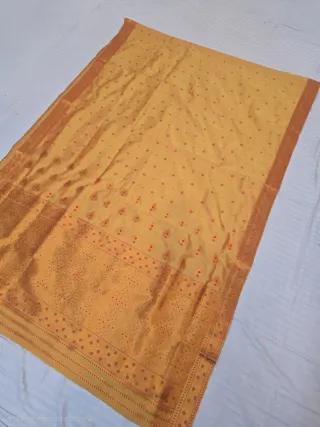 Mustard Yellow with Rani Pink and Gold Zari Weave Assam Silk Saree