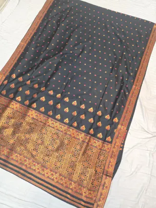 Jet Black with Rani Pink and Gold Zari Weave Assam Silk Saree