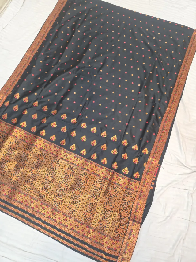 Jet Black with Rani Pink and Gold Zari Weave Assam Silk Saree