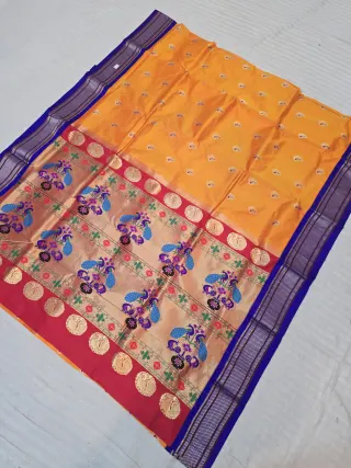 Haldi Yellow with Gold Zari Paisley Buti and Navy Blue Peacock Tissue Pallu Pure Mulberry Paithani Silk Saree