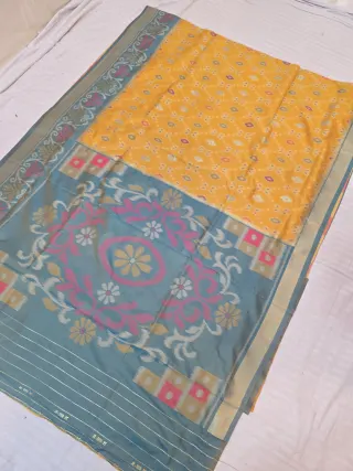 Marigold Yellow Patola and Slate Teal Contrast Medallion Pallu Pure Silk Saree