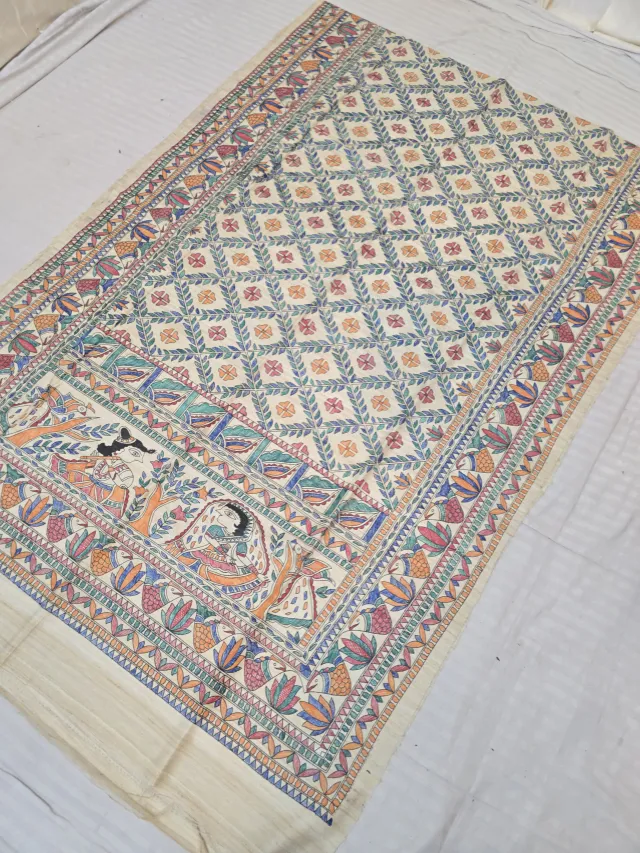 Natural Cream Pure Ghicha Tussar Silk Saree with Hand-Painted Multi-Colour Madhubani Trellis and Krishna Flute Pallu