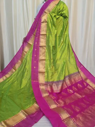 Parrot Green Pure Kanjivaram Silk Saree with Rani Pink Contrast Gold Zari Brocade Pallu
