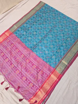 Sky Blue and Rani Pink Mayil Peacock Floral Grid Patola Ikkat Soft Silk Saree