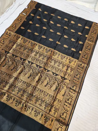 Jet Black and Golden Zari Woven Royal Narrative Swarnachari Soft Silk Saree