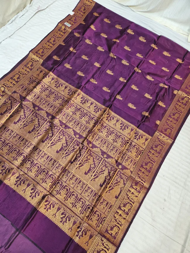Purple and Golden Zari Woven Royal Narrative Swarnachari Soft Silk Saree