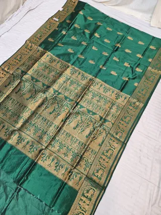 Emerald Green and Golden Zari Woven Royal Narrative Swarnachari Soft Silk Saree
