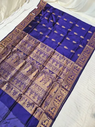 Royal Blue and Golden Zari Woven Royal Narrative Swarnachari Soft Silk Saree