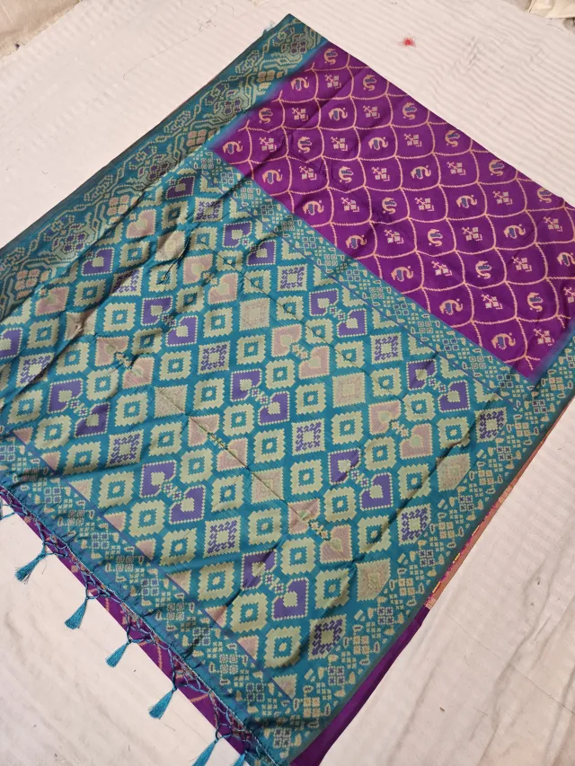 Violet Purple Ikkat Kota Soft Silk Saree with Geometric Check & Contrast Turquoise Patola Zari Pallu