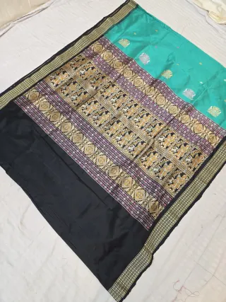 Sea Green and Black Contrast Figurative Narrative Weave Pure Mulberry Silk Saree