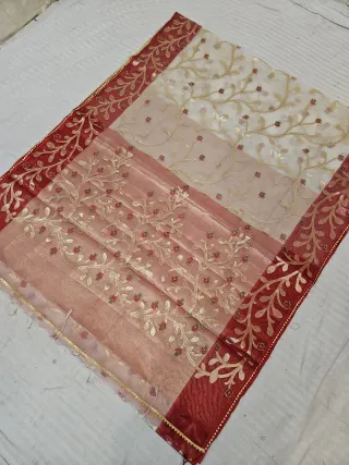 Ivory White and Peach Pink Muslin Jamdani Soft Silk Saree with All-Over Floral Jaal and Crimson Red Border