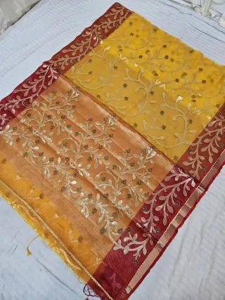 Sunshine Yellow and Sunset Peach Muslin Jamdani Soft Silk Saree with All-Over Floral Jaal and Crimson Red Border