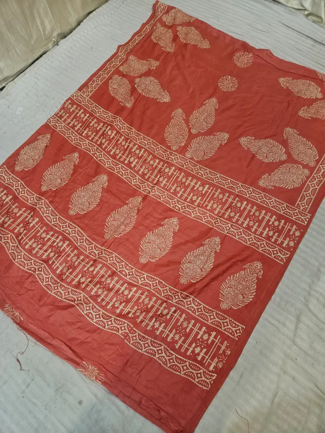 Rust Orange Hand Block Printed Bafta Silk Saree with Paisley Kalkas and Traditional Aanchal