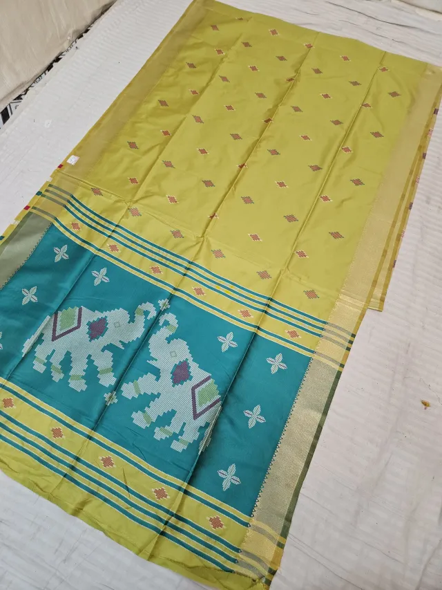 Haldi Yellow and Contrast Teal Soft Silk Saree with Kalakshetra Replica Elephant Motifs
