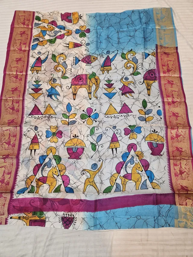 Sky Blue and Off-White Pure Bangalore Silk Saree with Woven Baluchari Border and Handcrafted Warli Folk Art Batik Handprint