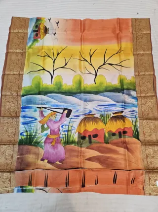 Sunset Orange Pure Bangalore Silk Saree with Woven Baluchari Border and Handcrafted Bengal Rural Village Baul Handprint Art