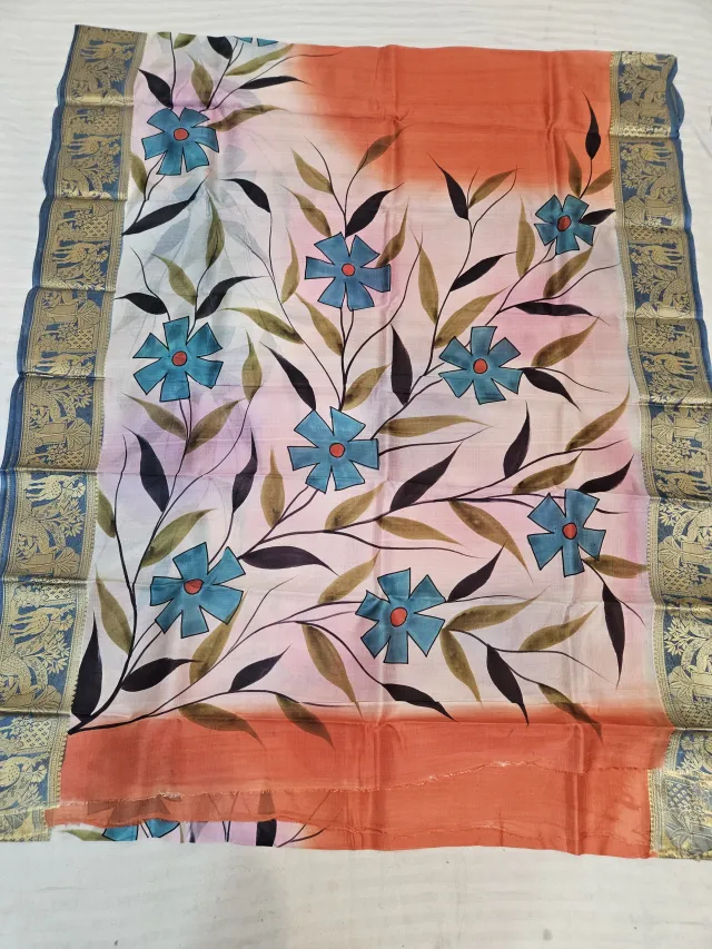 Sunset Orange and Ivory Pure Bangalore Silk Saree with Woven Baluchari Border and Handcrafted Turquoise Star Floral Handprint Art