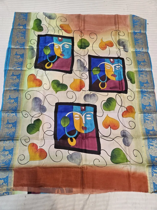 Ivory and Sky Blue Pure Bangalore Silk Saree with Woven Baluchari Border and Handcrafted Cubist Folk Face Handprint Art