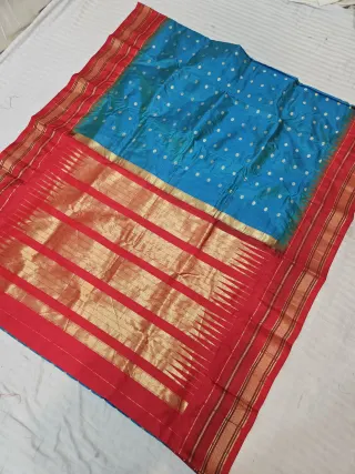 Sky Blue and Crimson Red Pure Mulberry Silk Buti Gadwal Saree with Woven Golden Zari Temple Border and Rich Brocade Pallu