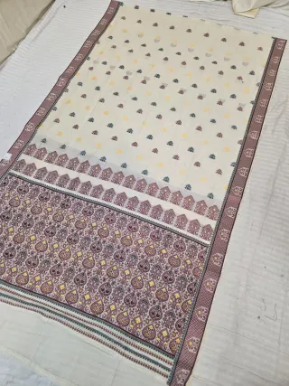 Cream and Maroon Assam Tussar Soft Silk Saree with Traditional Woven Tribal Motifs and Rich Ornamental Pallu