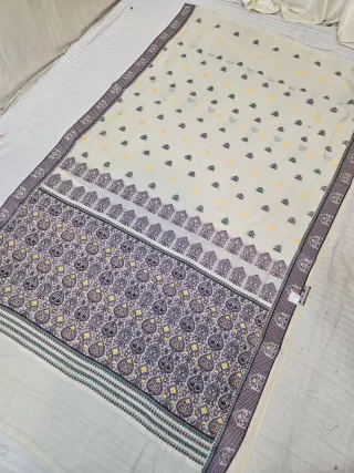 Cream and Royal Purple Assam Tussar Soft Silk Saree with Traditional Woven Tribal Motifs and Rich Ornamental Pallu