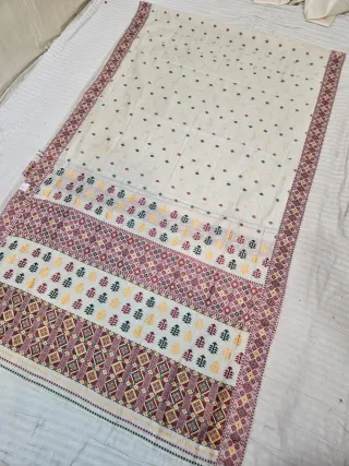 Cream and Maroon Assam Tussar Soft Silk Saree with Traditional Woven Tribal Geometric Motifs and Lattice Pallu