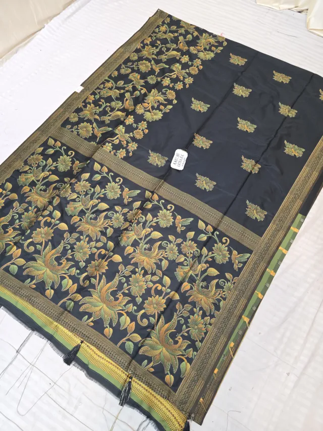 Jet Black Fancy Soft Silk Saree with Traditional Kantha Stitch Floral Jaal and Peacock Pictorial Tasselled Pallu