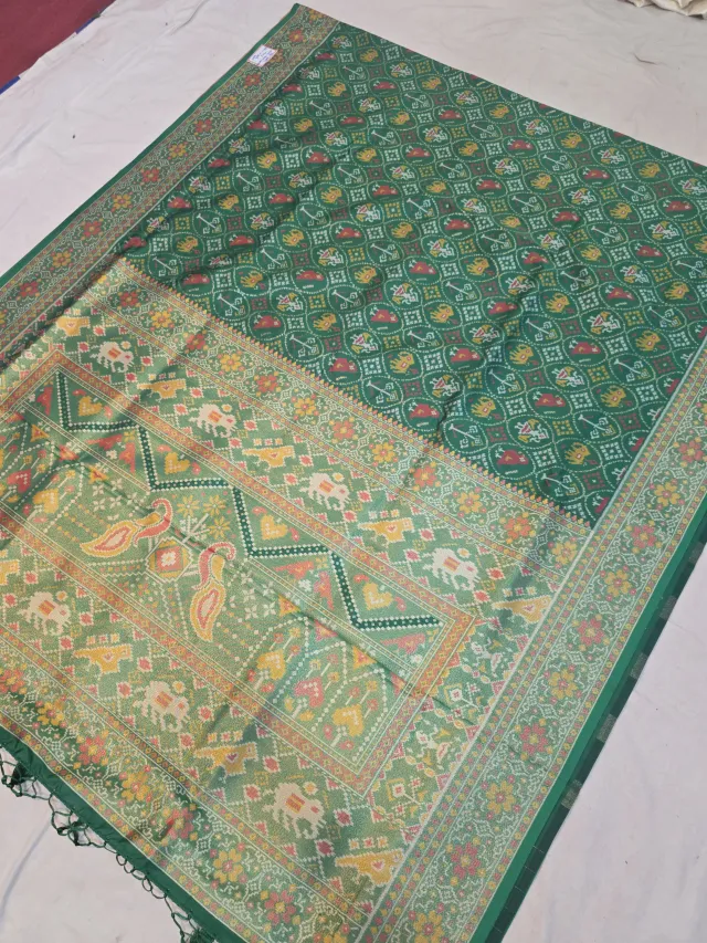 Emerald Green Soft Silk Saree with Ikkat Elephant & Figurative Print Jaal and Woven Time Border