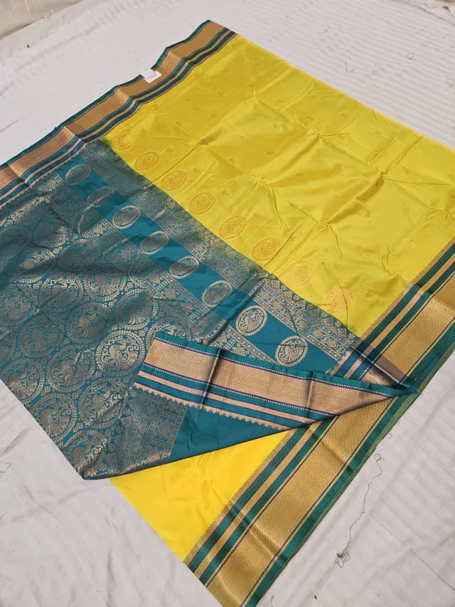 Lemon Yellow Soft Silk Saree with Gadwal Peacock Buta and Contrast Peacock Teal Zari Pallu