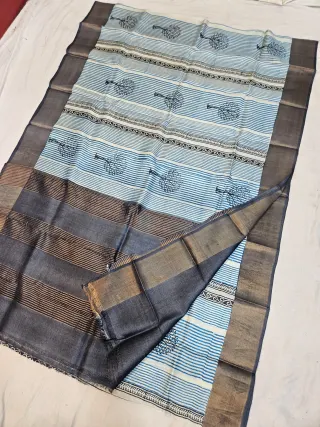 Off-White and Sky Blue Pure Gachi Tussar Block Print Saree with Tree Motifs and Charcoal Pallu