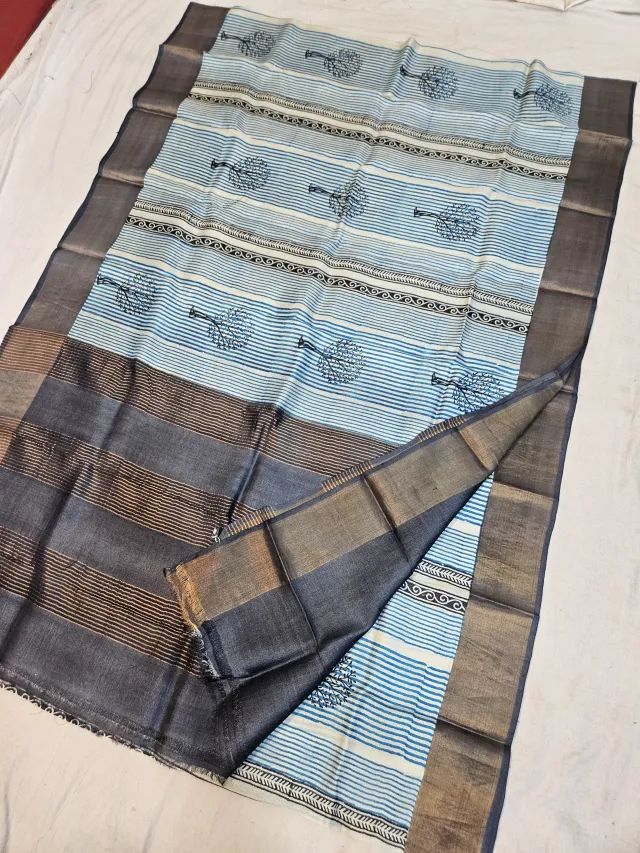 Off-White and Sky Blue Pure Gachi Tussar Block Print Saree with Tree Motifs and Charcoal Pallu