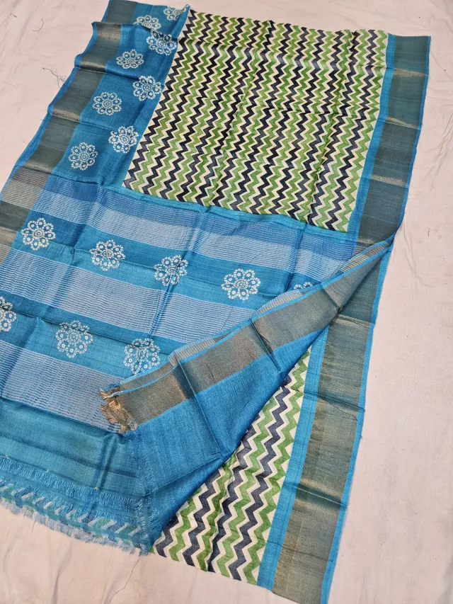 Off-White and Cyan Blue Pure Gachi Tussar Block Print Saree with Chevron Waves and Bandhani Rosette Pallu