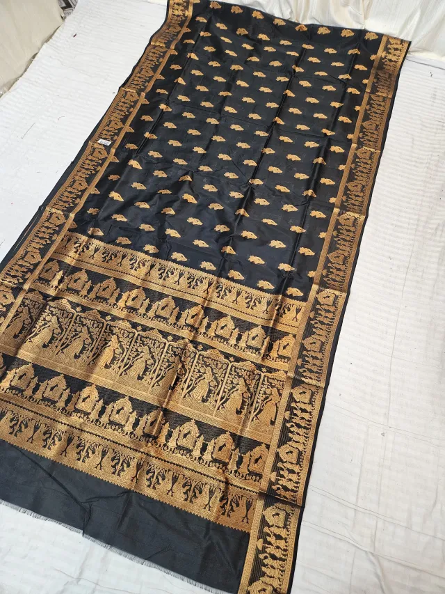 Jet Black Self Zari Swarnachari Soft Silk Saree with Mythological Narrative Pallu