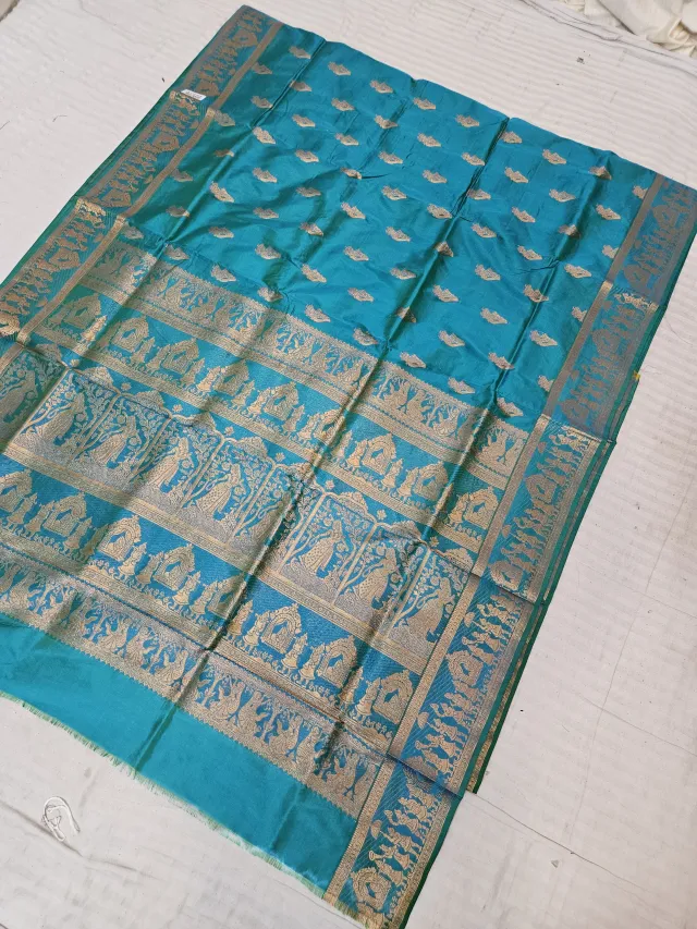 Peacock Teal Blue Self Zari Swarnachari Soft Silk Saree with Mythological Narrative Pallu