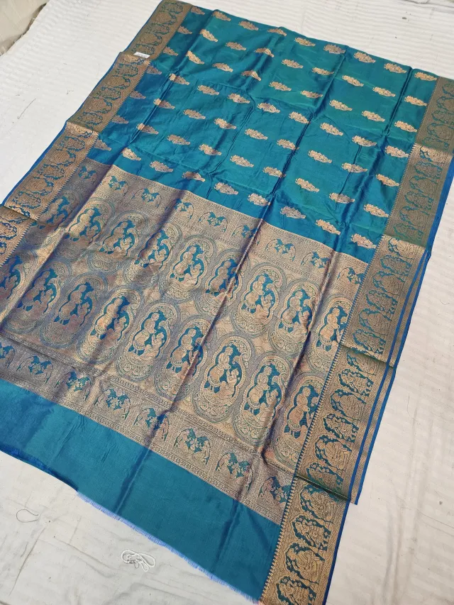 Deep Teal Blue Self Zari Swarnachari Soft Silk Saree with Mythological Narrative Pallu