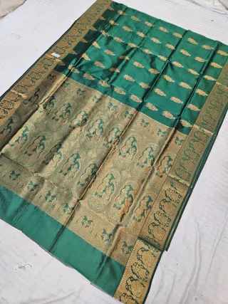 Forest Green Self Zari Swarnachari Soft Silk Saree with Mythological Narrative Pallu