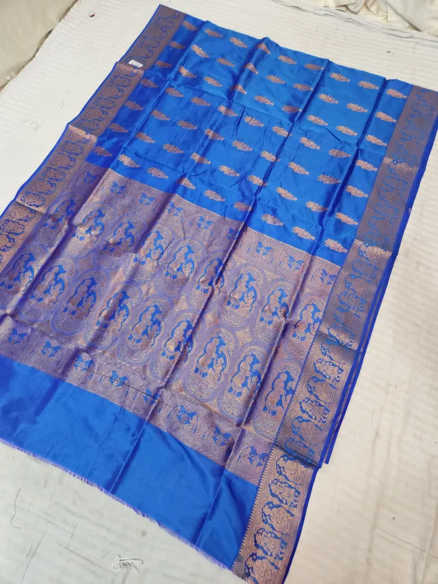 Royal Azure Blue Self Zari Swarnachari Soft Silk Saree with Mythological Narrative Pallu