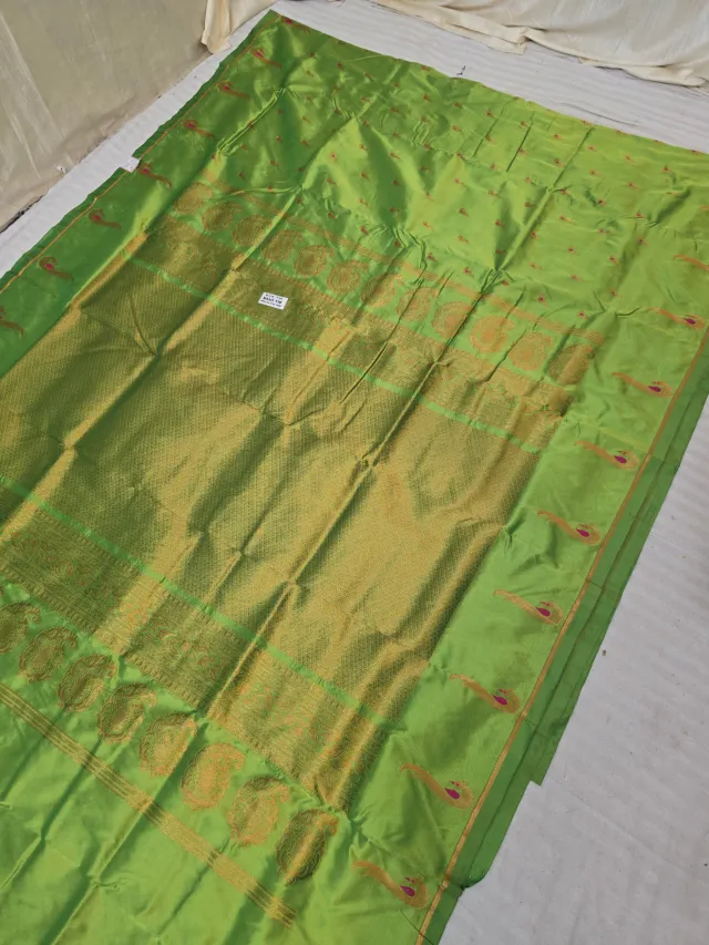 Light Parrot Green Soft Silk Irkal Self Saree with Woven Gold Zari Lattice Brocade Pallu & Peacock Border
