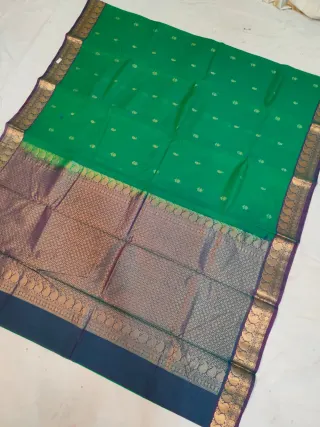 Emerald Green Ratnagiri Pure Silk Saree with All-Over Zari Paisley Butas & Navy Contrast Brocade Kalka Border