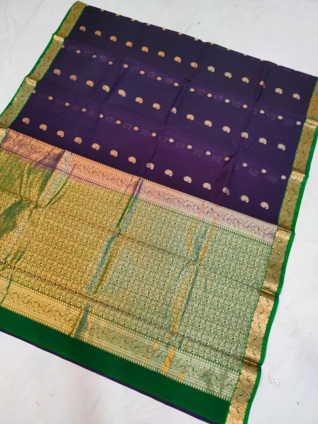 Deep Royal Purple Ratnagiri Pure Silk Saree with All-Over Zari Paisley Butas & Green Contrast Brocade Kalka Border