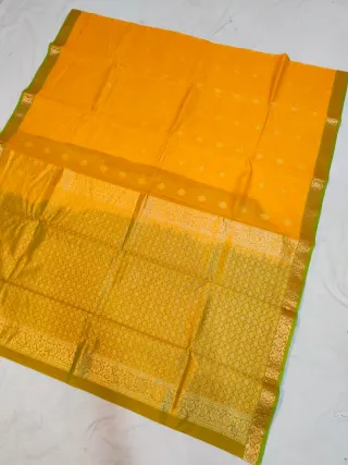 Turmeric Yellow Ratnagiri Pure Silk Saree with All-Over Zari Diamond Butas & Olive Green Contrast Brocade Border