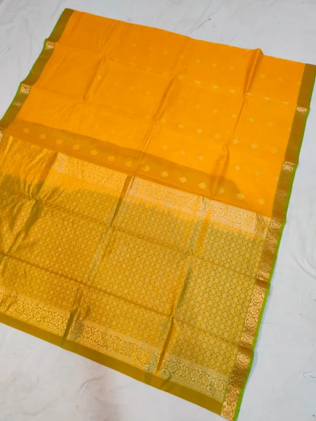 Turmeric Yellow Ratnagiri Pure Silk Saree with All-Over Zari Diamond Butas & Olive Green Contrast Brocade Border