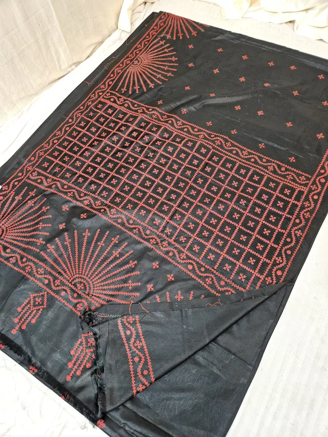 Jet Black Blended Bangalore Silk Saree with Terracotta Rust Gujarati Stitch Sunburst & Geometric Grid Embroidery