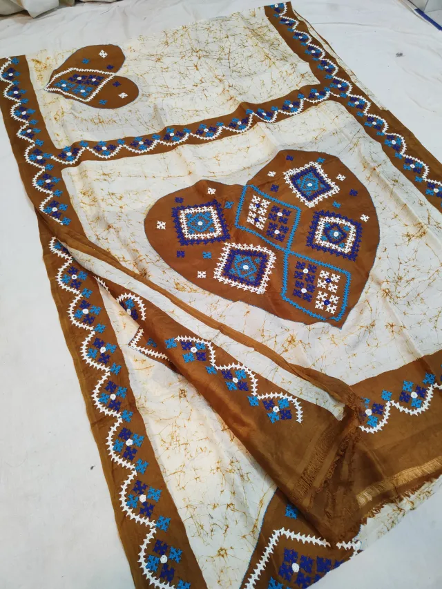 Off-White & Caramel Brown Pure Murshidabad Silk Saree with Hand Batik & Kantha Stitch Heart Medallion Pallu