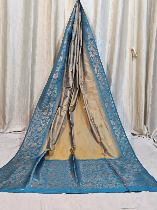 Premium Beige and Peacock Blue Leaf Motif Soft Silk Saree