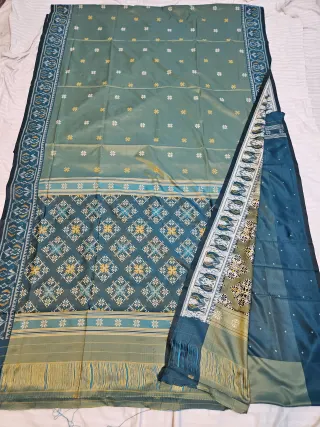 Premium Dual-tone Sea Green with subtle golden yellow Art Silk Ikkat Saree
