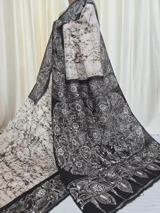 Off-White and Black Pure Murshidabad Silk Soru Tuli Batik Saree with Peacock Motif