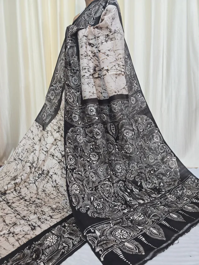 Off-White and Black Pure Murshidabad Silk Soru Tuli Batik Saree with Peacock Motif