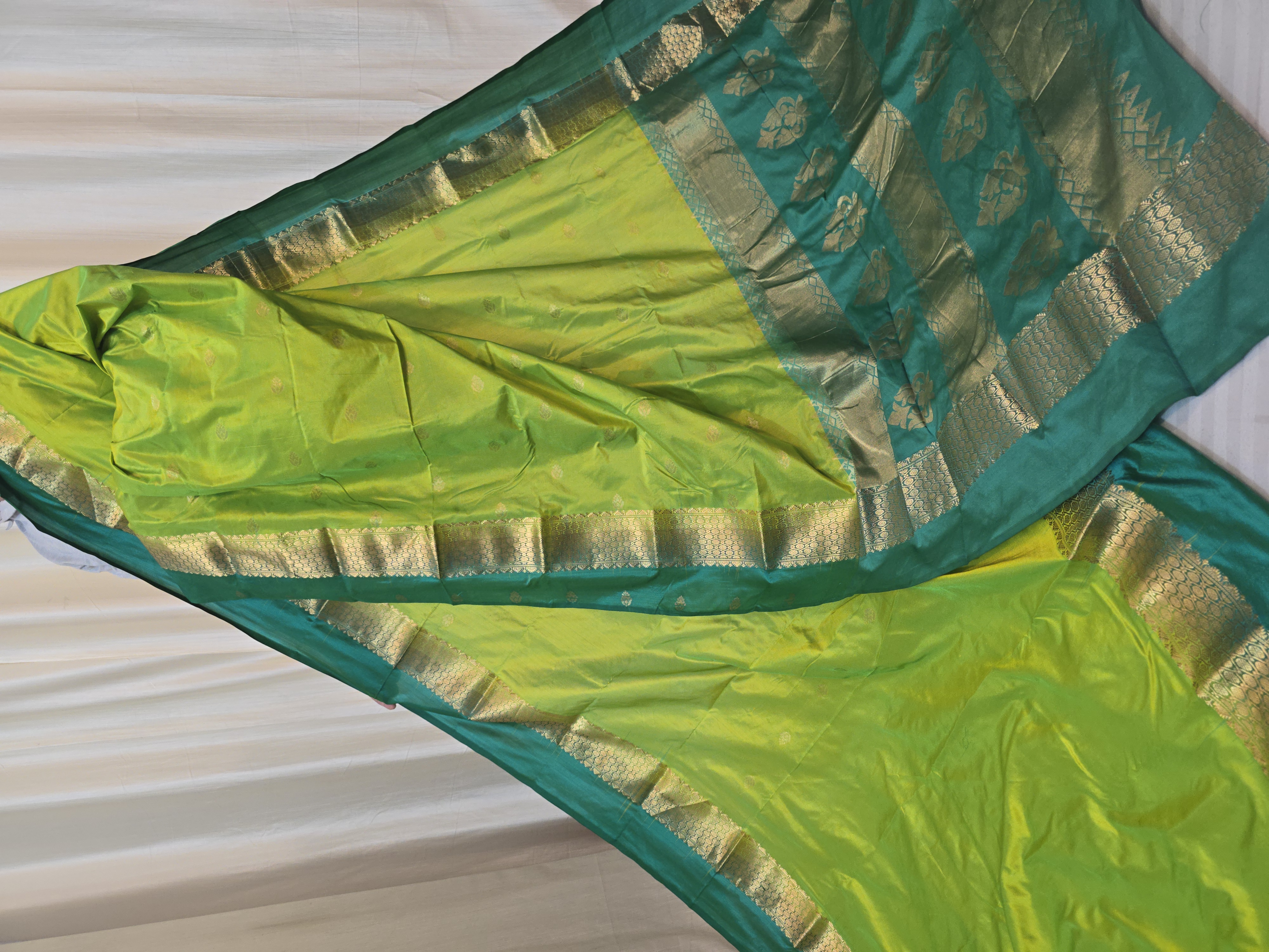 Parrot Green Pure Kanjivaram Silk Saree with Teal Green Contrast Gold Zari Brocade Pallu